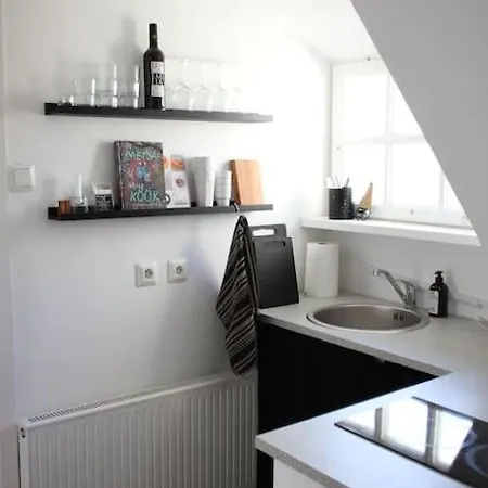 アパート Cozy Penthouse In Town Wall